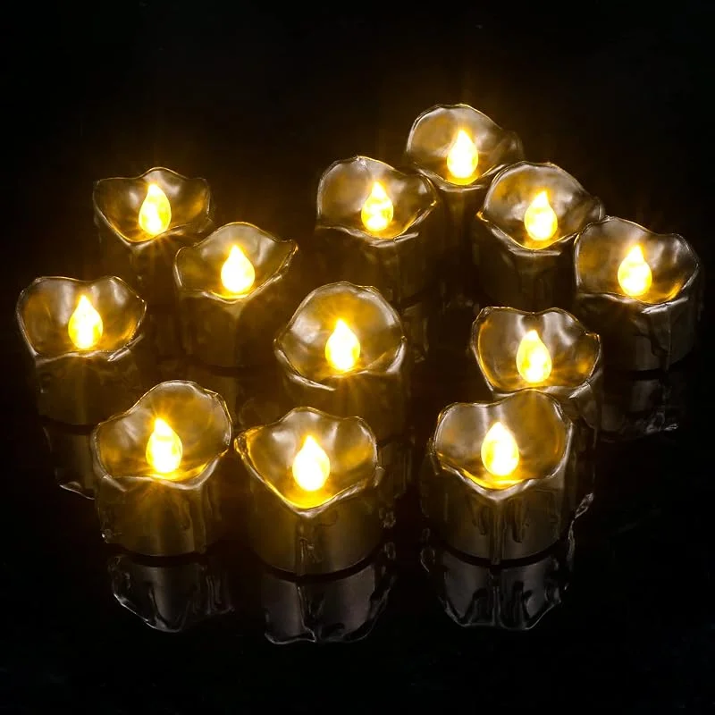 Visita la tienda de PChero PChero Velas de té LED negras, 12 unidades, funcionan con pilas, luces eléctricas sin llama, velas de té parpadeantes para Halloween, fiestas, decoración del hogar, color amarillo cálido — Cena a la luz de velas