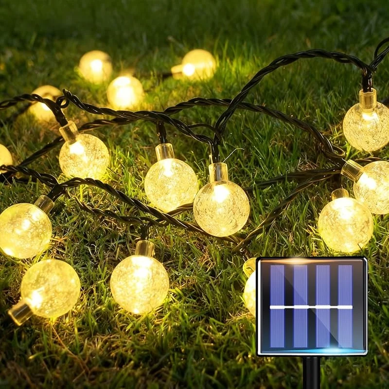 Visita la tienda de taiyongkang Guirnaldas Luces Exterior Solar, Cadena de Luces Solares 15M 60 LED con Bolas de Cristal, 8 Modos IP65 Guirnalda de Luces Exterior Solar para Jardin Balcon Terraza Fiestas Navidad Blanco Calido — Luces Navidad