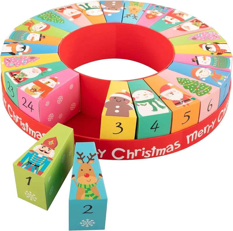 Visita la tienda de Idena Idena 31492 - Calendario de Adviento para Rellenar, 24 Cajas de Regalo numeradas con Motivos navideños, Calendario de Navidad Redondo de Aprox. 31, 5 x 6, 5 cm — Envoltorio regalo