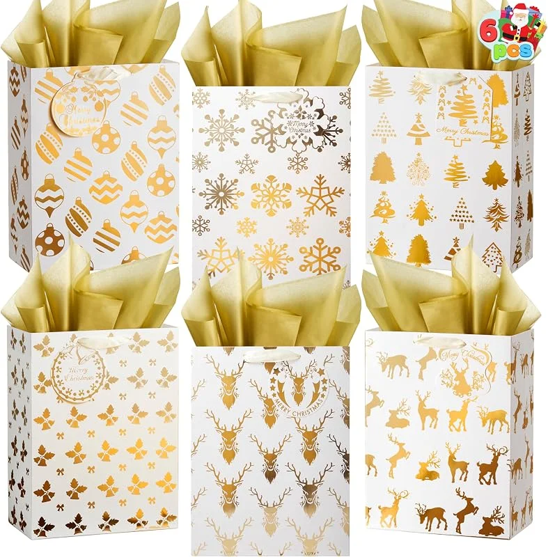 Visita la tienda de JOYIN JOYIN 6 bolsas de regalo de Navidad doradas con papel de seda, 8 x 4.5 x 10.5 pulgadas, 6 diseños de impresiones de invierno para regalos, decoración de suministros de fiesta, envoltura de dulces de — Envoltorio regalo